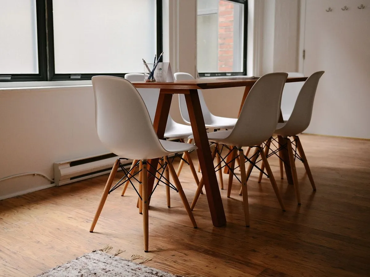 Empty meeting room with chairs around a table