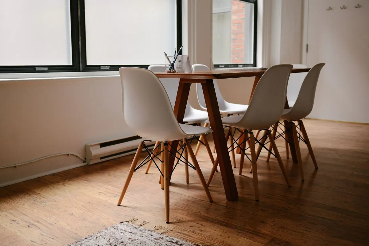 Empty meeting room with chairs around a table